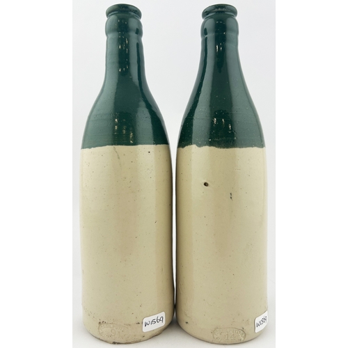 211 - CANADIAN GURDS GINGER BEER DUO. Tallest 9ins. GREEN TOPS, black transfer. One with centre t.m. Blow ... 