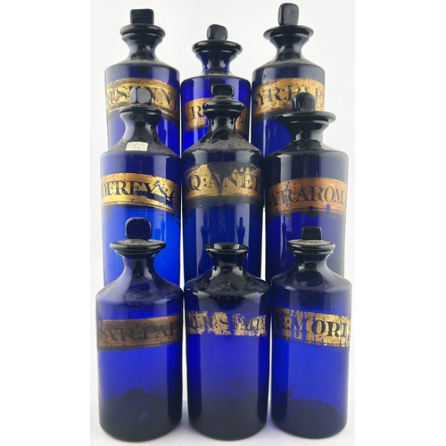 213 - PHARMACY SHOP ROUND GROUP. Tallest 9.5ins. Wonderful large group of mainly pontilled, cobalt glass, ... 