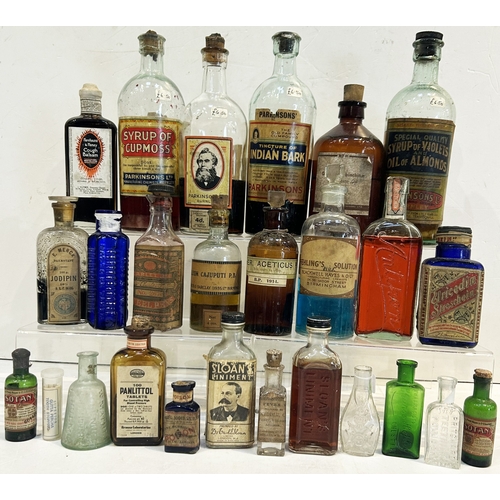 229 - CHEMIST BOTTLE GROUP. Largest 9.5ins. Mainly paper labelled, syrups, some contents. Worn. (26) 6/10 ... 