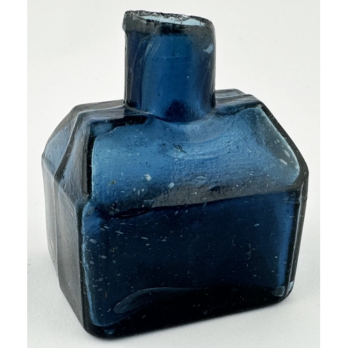 454 - UNEMBOSSED BLUE GLASS COTTAGE INK BOTTLE. 2.2ins tall. An extraordinary sheared lip, dark topaz glas... 