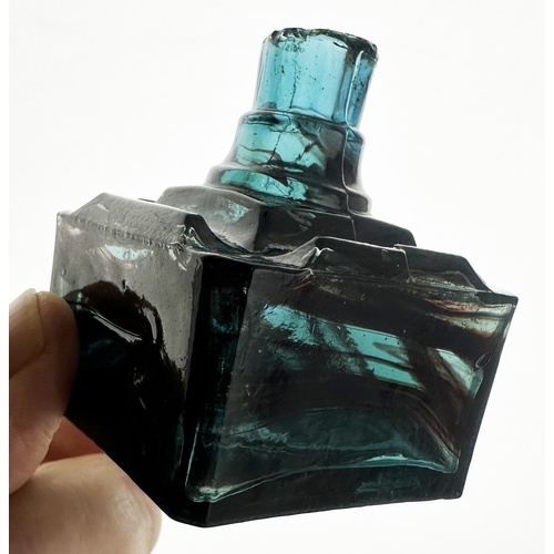 464 - FM & CO INK BOTTLE. (Inks book p130, 12.1). 2.25ins tall. Aqua blue glass with brown swirl pattern, ... 