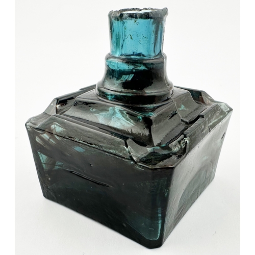 464 - FM & CO INK BOTTLE. (Inks book p130, 12.1). 2.25ins tall. Aqua blue glass with brown swirl pattern, ... 