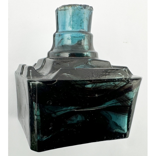 464 - FM & CO INK BOTTLE. (Inks book p130, 12.1). 2.25ins tall. Aqua blue glass with brown swirl pattern, ... 