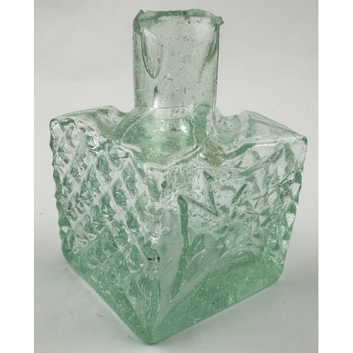 465 - VICTORIA CROSS MEDAL INK BOTTLE. (Inks book p102, D7.4). 2.5ins tall. Aqua glass, chunky cubic patte... 