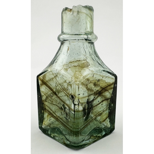 469 - F M & CO INK BOTTLE WITH BODY SWIRLS . (Inks book p131, 12.1). 2.6ins tall. Appealing sheared long l... 