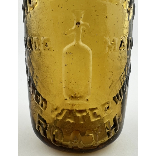 476 - ROATH AMBER CODD BOTTLE. 7.5ins tall. Embossed WATSON & CO/ THE CARDIFF/ AERATED WATER WORKS featuri... 