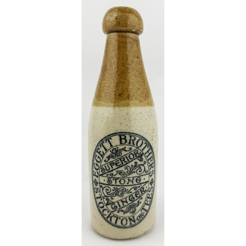 485 - STOCKTON ON TEES GINGER BEER BOTTLE. ??ins tall. Ch, t.t, blob lip. Decorative transfer EGGETT BROTH... 