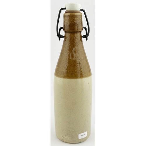 488 - W & J JANKINSON LEIGH GINGER BEER BOTTLE. ??ins tall. Ch, t.t, (speckled dark tan top glaze), swing ... 