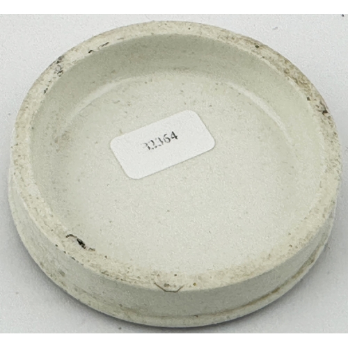 499 - MANCHESTER OINTMENT POT LID. (APL p424, 34) 2.3ins diam. Black transfer with belt & buckle outer bor... 