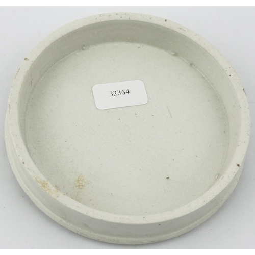 501 - CHELTENHAM OINTMENT POT LID. (APL p158,12) 3.2ins diam. Black transfer, ornate lines around the many... 