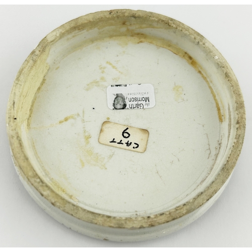 507 - DEVONPORT POT LID. (APL p86, 53) 3.3ins diam. Black transfer with a very decorative border surroundi... 