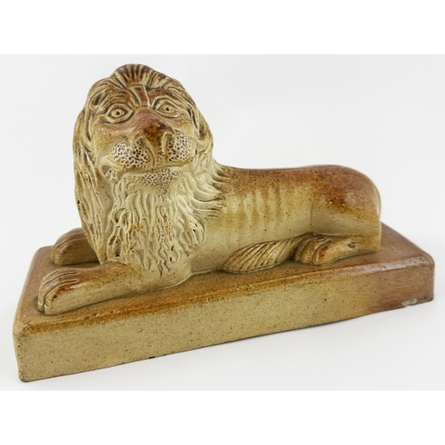 517 - BRAMPTON LIONS DUO. Rectangular base 8.2 x 3.5ins. Attractive well modelled pair of lions, each atop... 