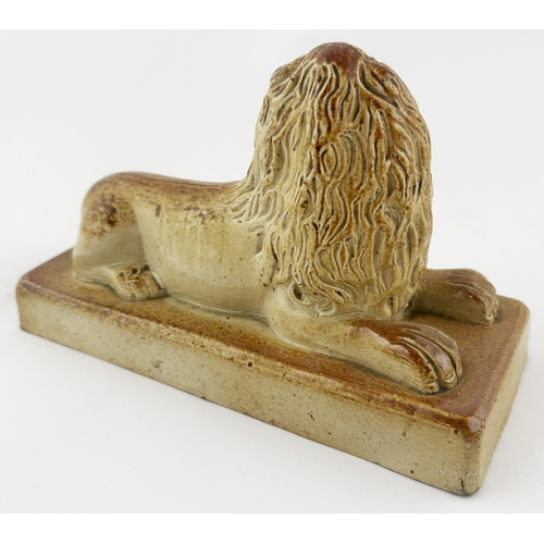 517 - BRAMPTON LIONS DUO. Rectangular base 8.2 x 3.5ins. Attractive well modelled pair of lions, each atop... 