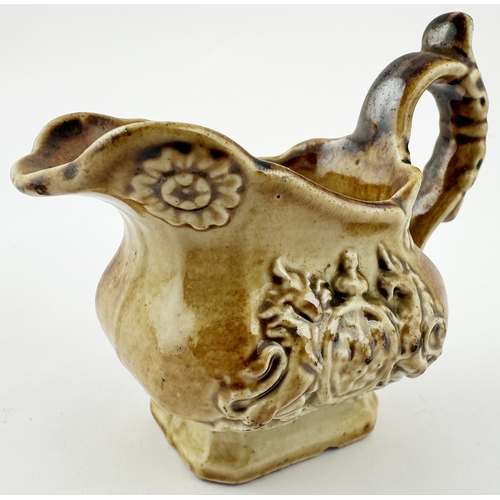 519 - BRAMPTON MINI JUG. 2.75ins tall. A delightful small salt glaze rectangular based jug. Ornate handle.... 