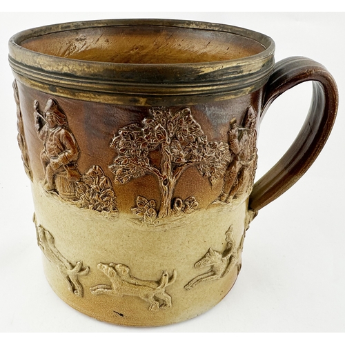 530 - LARGE SILVER RIMMED EARLY MUG. 6.4ins tall. Giant t.t., salt glaze, - top half dark brown. Various d... 