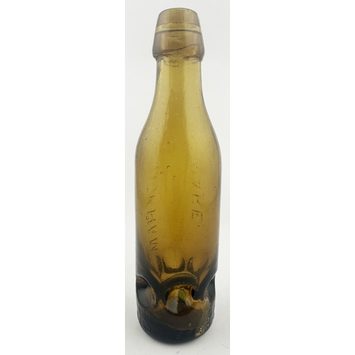 532 - WICKHAM WARE SYKES MACVAY PATENT CODD BOTTLE. 9ins tall. Golden amber glass, 10oz capacity. Sykes Ma... 