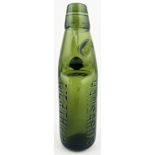 534 - MERTHYR CODD BOTTLE. 8ins tall. Dark Olive green glass, heavily embossed HANSARDS/ GENUINE/ AERATED ... 