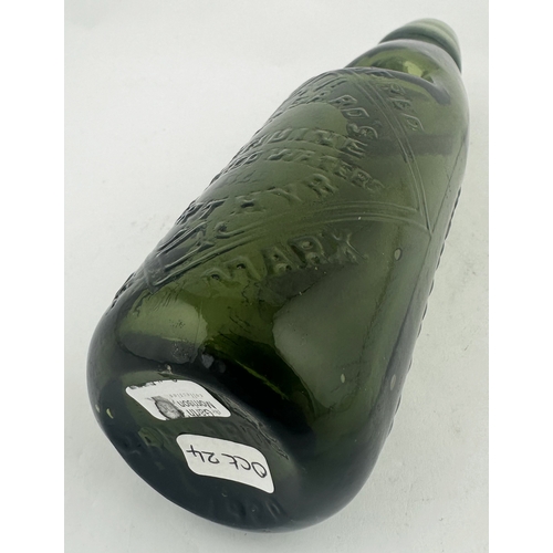 534 - MERTHYR CODD BOTTLE. 8ins tall. Dark Olive green glass, heavily embossed HANSARDS/ GENUINE/ AERATED ... 