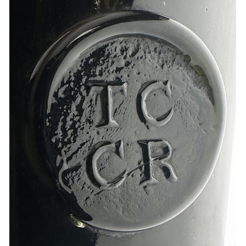 547 - TRINITY COLLEGE COMMON ROOM OXFORD SEALED WINE BOTTLE. 10.8ins. Black, very dark, three part wine bo... 