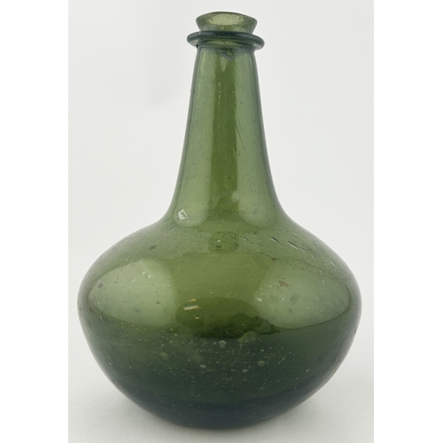 553 - ENGLISH SHAFT & GLOBE WINE BOTTLE. 7.7ins tall. An outstanding, nay quite superb, example of an Engl... 