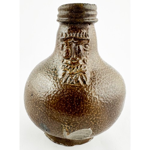 450 - BELLARMINE JUG. 5.25ins tall. A delightful, very rare, diminutive (small!) dark brown orange peel ef... 