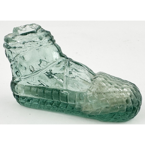29 - RUSSIAN SHOE INK BOTTLE. (Inks book p317, S16.14). 2ins tall. Clear glass, sheared lip detailed shoe... 