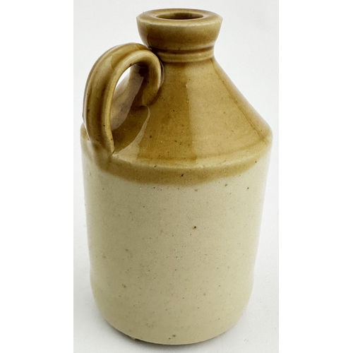 110 - HARINGEY WOOD GREEN MINIATURE FLAGON. 3.6ins tall, t.t. handled flagon, front transfer G W TAME/ THE... 