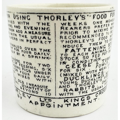 115 - THORLEYS ANIMAL FEED MUG. 3ins high. Off white straight sided mug with crudely applied side handle. ... 