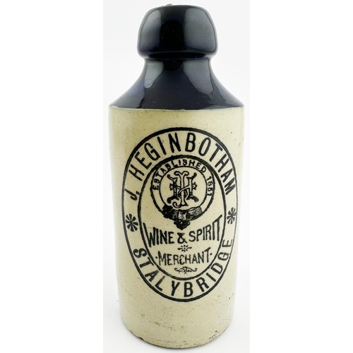 64 - STALYBRIDGE GINGER BEER BOTTLE. 6.6ins tall, std, t.t., blop top, cork still in place. Dark blue top... 