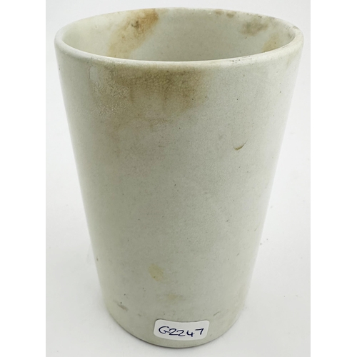 70 - AS NEW OR PURE MILK BEAKER. 4.1ins tall. White with simple black transfer, shield saying NOT GUARANT... 