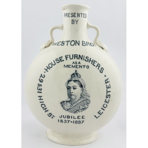 73 - LEICESTER FURNISHERS QUEEN VICTORIA GOLDEN JUBILEE COMMEMORATIVE FLASK. 9.2ins tall. White, black tr... 