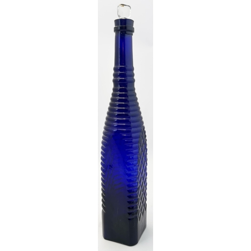 76 - GRIMBLE VINEGAR BOTTLE. 18.9ins tall. Cobalt blue body, original, bevel edged, clear glass, chisel s... 