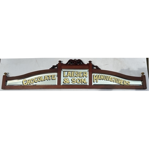 93 - LAESER &B SON CHOCOLATE MANUFACTURERS. 43.5 x 10ins. Two colour ornate/ shapely wooded frame, very w... 