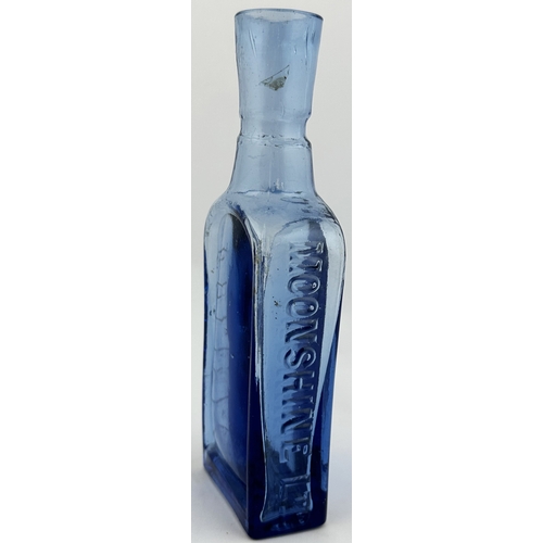 40 - CARLISLE LEATHER POLISH BOTTLE. 6.75ins tall. Embossed side panels. Moonshine. Unusual neck. Slight ... 