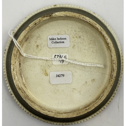 46 - LONDON POT LID. 3.7ins diam. Black print & green background with serrated edge. Rimmels. Light body ... 