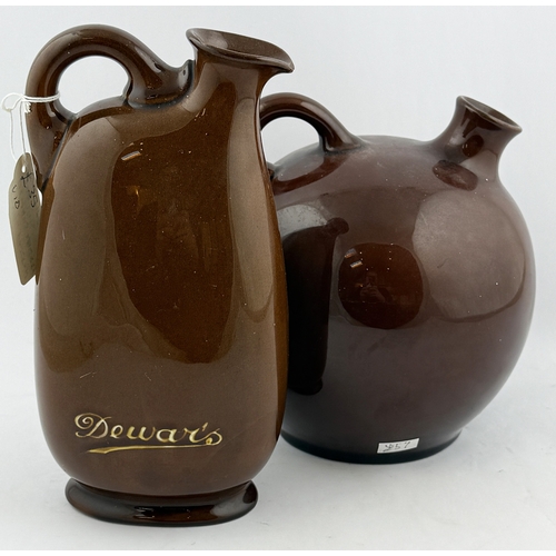 62 - KINGSWARE FLASK DUO. 8.25ins tall. John Barleycorn & The Pipe major. One chipped. (2)