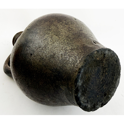 362 - BELLARMINE.8.5ins. Dark salt glaze bellarmine jug, wire cut base, small kiln touch to one side but o... 