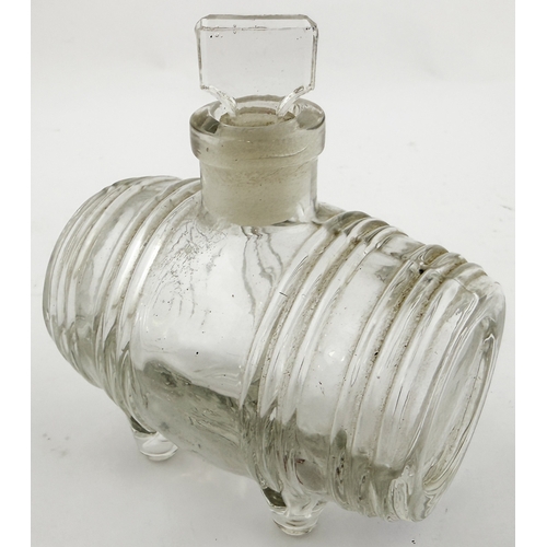 385 - N ANTOINE FOOTED BARREL INK BOTTLE. 3.25 ins long. Burch p32. A12.22. Described as very rare. Side l... 