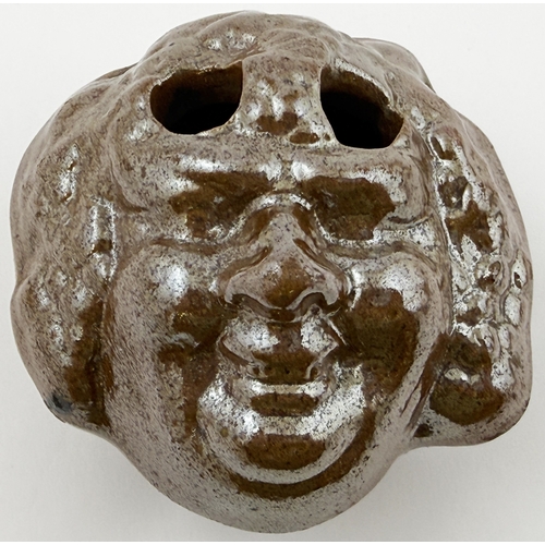 389 - BACCHUS HEAD INK BOTTLE. 2.4ins tall. Shiny salt glaze ink modelled as Bacchus, Roman God of wine. T... 