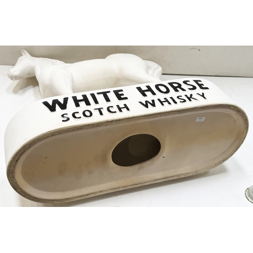 WHITE HORSE WHISKY STATUE. 18ins tall. Ceramic back bar statue of