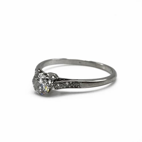 99 - A diamond single stone ring, the white mount unmarked, the brilliant cut of 0.4 carats estimated, wi... 