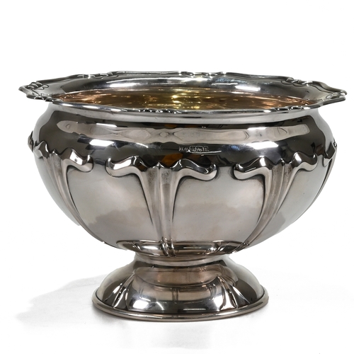 113 - A silver rose bowl, H. Atkin, Sheffield 1912, the bowl with art nouveau style decoration, shaped mou... 
