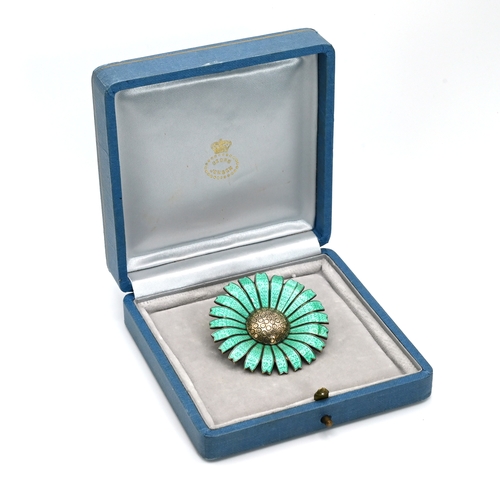 12 - Anton Michelin, a green enamelled Marguerite daisy pendant brooch, with London import markfor 1978, ... 