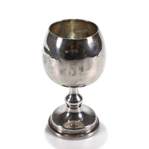 132 - A silver goblet, overstruck makers mark, London 1903, with presentation inscription, 14cm high, 156 ... 