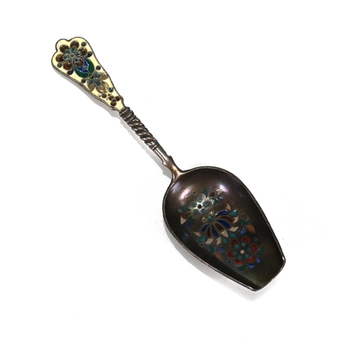 145 - A Russian silver and enamelled sugar spoon, with 84 zolotnik mark only, the shovel bowl with plique ... 