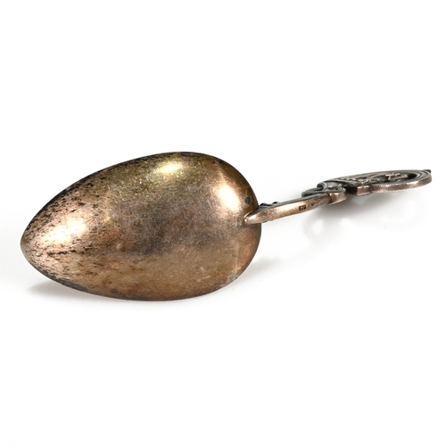 149 - Marius Hammer, Norway, a good parcel gilt caddy spoon, the handle in the Nordic mythological beast s... 