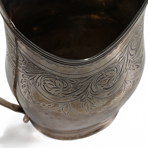 154 - A Georgian silver cream jug, makers mark worn, London 1805, of helmet shape, engraved with leafy who... 