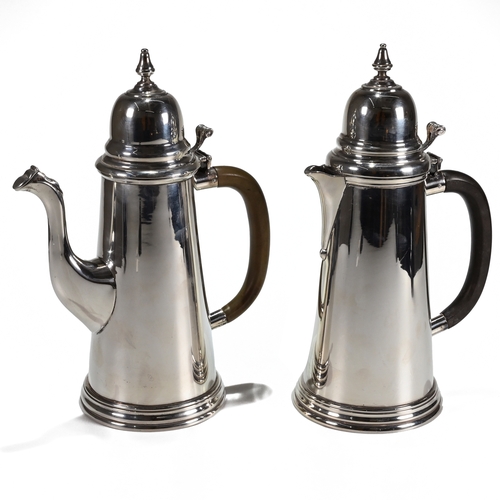 155 - A good matched pair of modern silver cafe au lait pots, Royal Irish Silver Ltd, Dublin 1969 and 1971... 