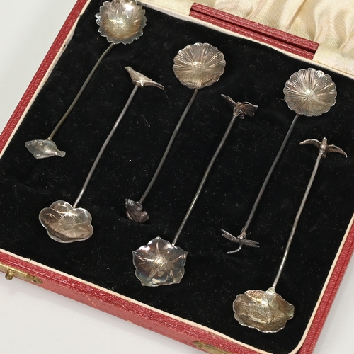 162 - A set of six bead ended coffee spoons, unmarked, in a Sargisons of Tasmania case; a set of silver sp... 