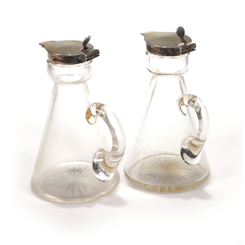 173 - A pair of silver mounted glass whisky noggins, Goldsmiths and Silversmiths Co Ltd, London 1912, 11.5... 